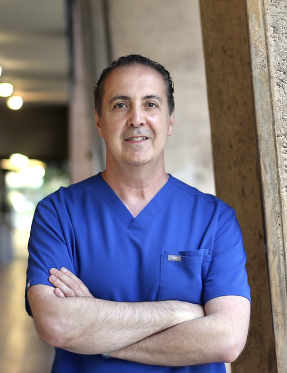 Dr. Raffy Karamanoukian MD FACS board-certified plastic surgeon performing precision liposuction abdominal etching body contouring mommy makeover liposuction and liposuction revision at Kare Plastic Surgery Santa Monica Los Angeles